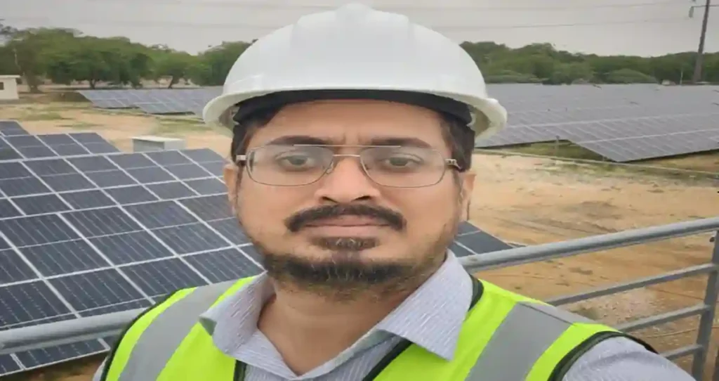 Engr. Syed Farrukh Anwar inspecting a commercial solar farm for cleaning and maintenance - SolarVision AI.